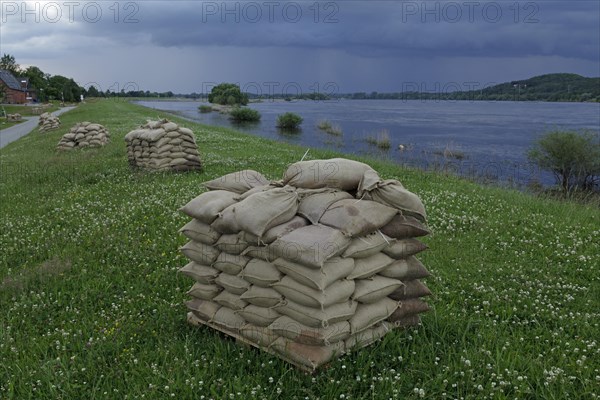 Sandbags on a dyke during a flood