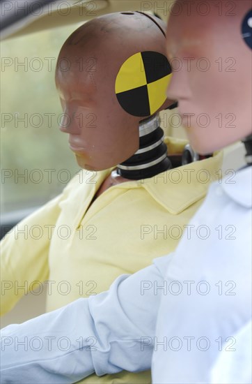 Crash test dummies in a car