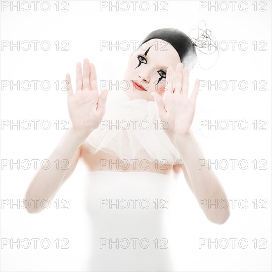Woman dressed up as a pierrot