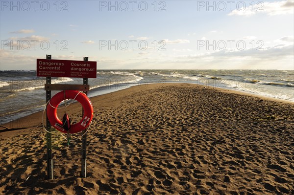Lifebuoy and warning sign on Canada's southernmost point on Lake Erie