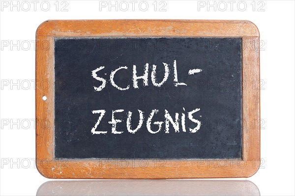 Old slate blackboard with the word "SCHUL-ZEUGNIS"