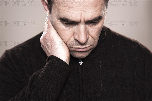 Man with markings for plastic surgery under his eye