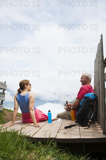 Hiking couple taking a break