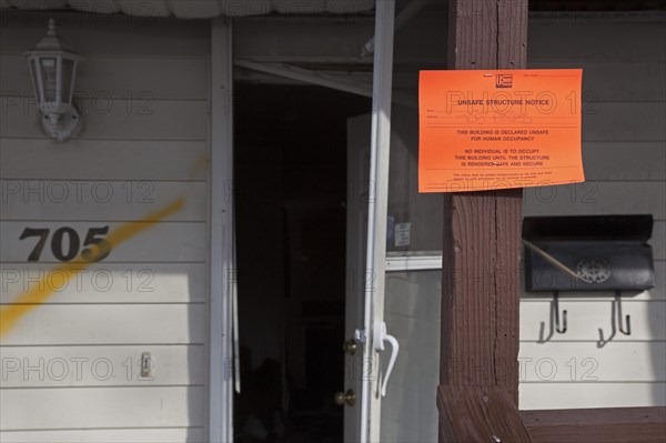 Unsafe Structure Notice on house severely damaged by Hurricane Sandy