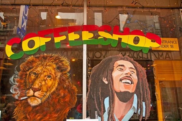 Painting of a smoking lion and the singer Bob Marley