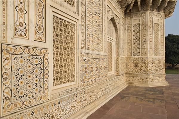 Façade with intricate marble inlays of an Islamic mausoleum