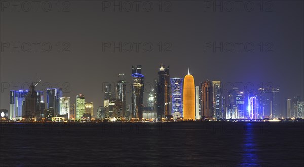 Skyline of Doha at night with the Al Bidda Tower