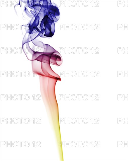 Colourful smoke from an incense stick or joss stick