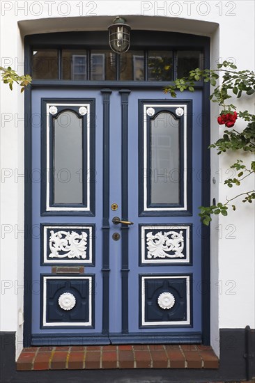 Historical house with decorative wooden door