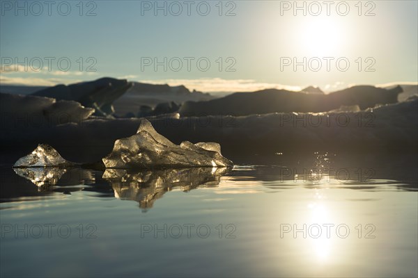 Pieces of ice in the evening light