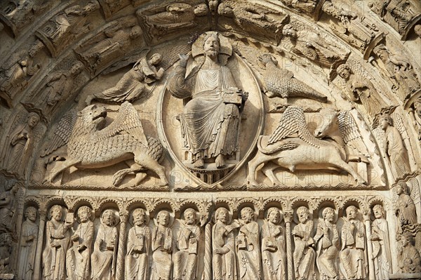 Gothic sculptures of Christ Pantocrator surrounded by the four Evangelist symbols