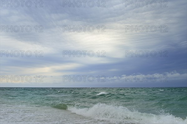 Storm clouds over the choppy sea