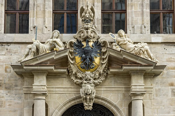 Crest with eagle and allegorical figures