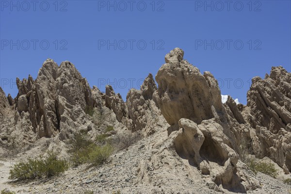 Geologic formations of a dry lake bed in the Monument Natural Angastaco