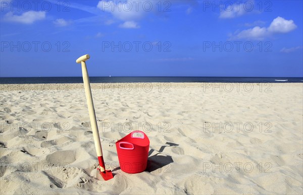 Bucket and spade on a beach
