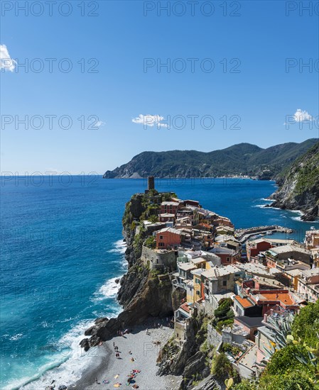 Colorful houses on cliffs with beach