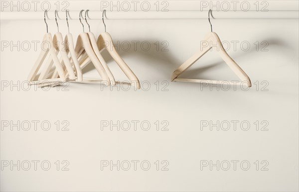 Empty hangers on a clothes rack