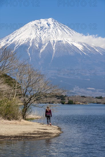 Young woman on the shore