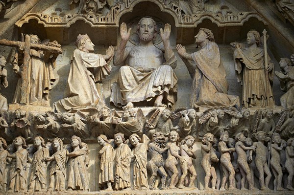 Gothic sculptures on the Tympanum of the central west portal depicting scenes from the Day of Judgement