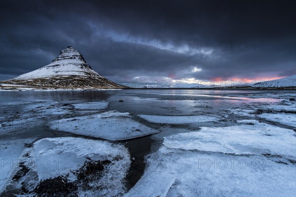 Peak of Kirkjufell with Kirkjufell river