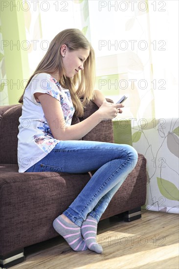 Teenage girl at home