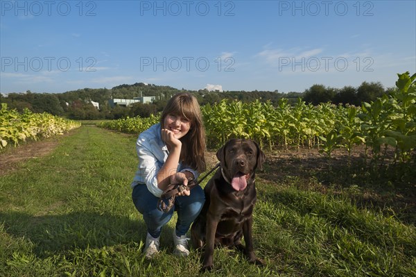 Girl with her Labrador