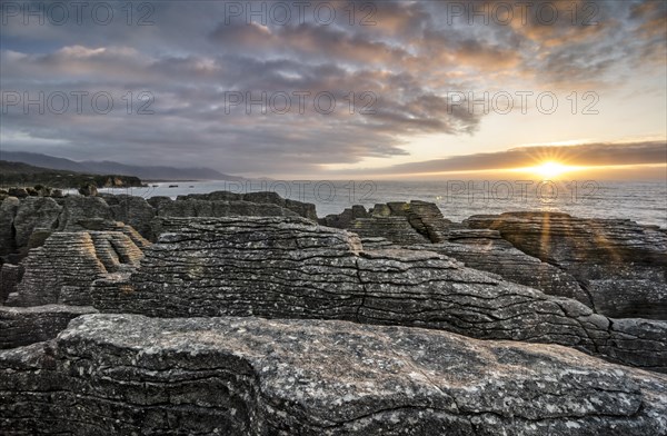 Sunset at the Pancake Rocks