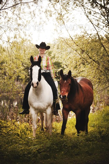 Female western rider on a Paint Horse