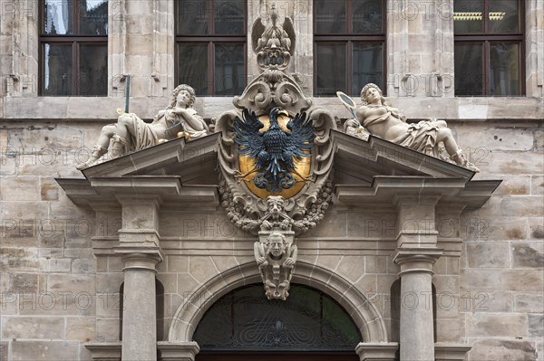 Portal of the west facade with imperial eagle and goddesses