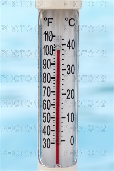 Pool thermometer showing 100 degrees Fahrenheit