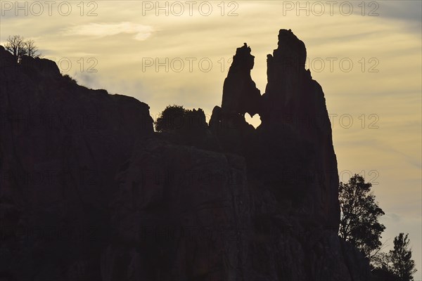 Heart-shaped hole in a rock in the Calanche