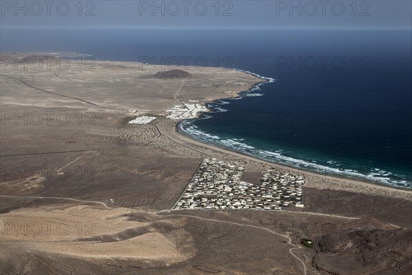 View from the Ermita de las Nieves on the Risco de Famara on the beach Playa de Famara