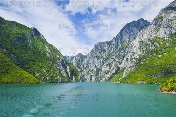 Sheer cliffs in the Koman water reservoir