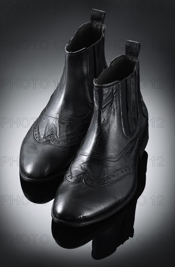 A pair of black ankle boots