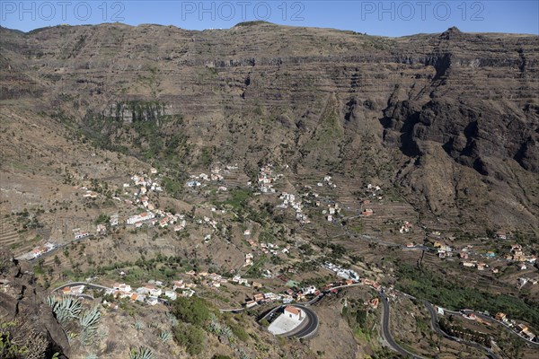 View from Mirador Cesar Manrique onto terraced fields and houses of Lomo del Balo and La Vizcaina
