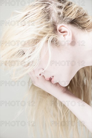 Young woman with long blond hair