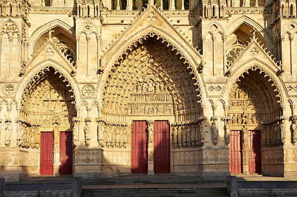 Tympanum of the central west portal of the Gothic Amiens Cathedral