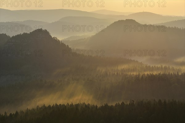 Fog and haze in the morning in the Elbe Sandstone Mountains