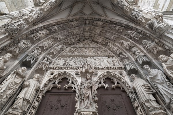 Gothic entrance portal with relief figures