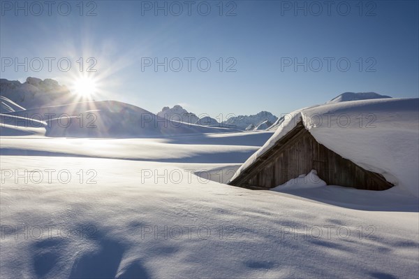 Sunrise on Sennes Alm at the Sennes refuge in the Fanes-Sennes-Prags Nature Park in the Dolomites