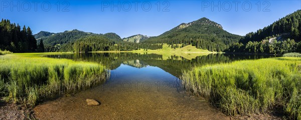 Mountains reflected in Lake Spitzingsee