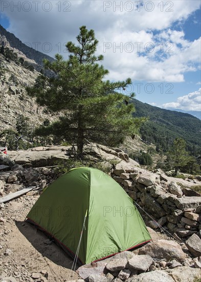 Tent on the hiking trail GR20 on the river Golo