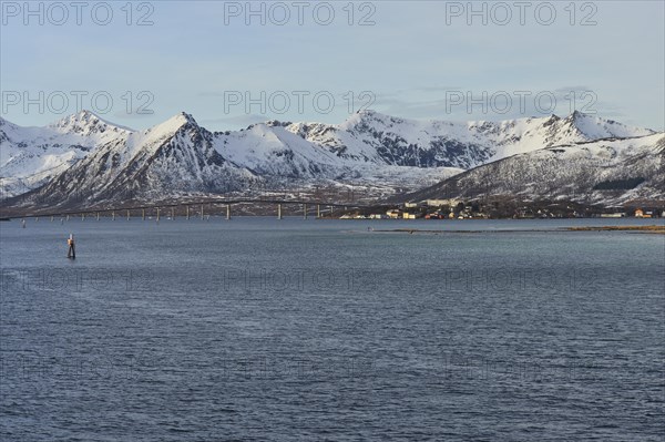 Mountains of the island of Andoya with Andoy bridge and Risoysund