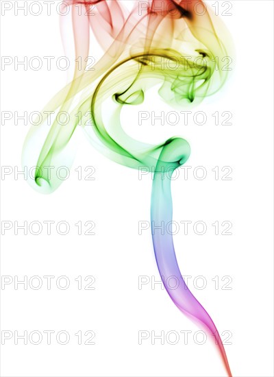 Colourful smoke from an incense stick or joss stick