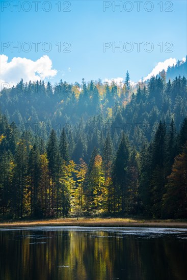 Lake Spitzingsee with autumn forest