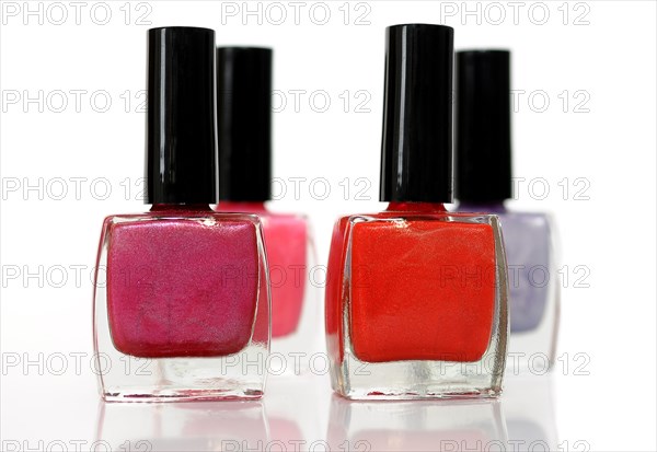 Four nail polish bottles