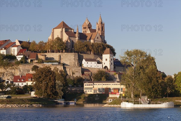 View across river Rhine to the Munsterberg hill with St. Stephansmunster cathedral