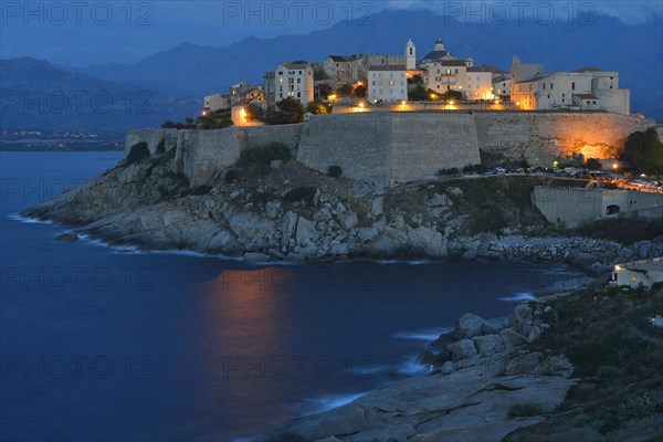 Old town with citadel at dusk