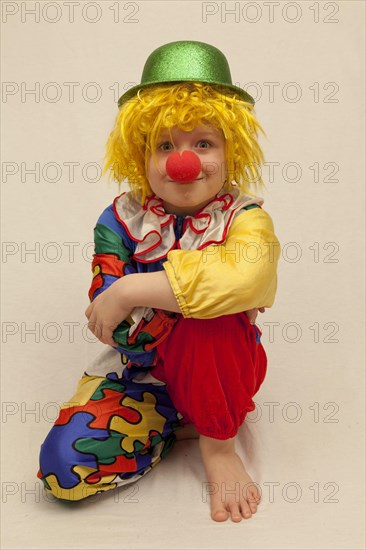 Boy dressed as a clown