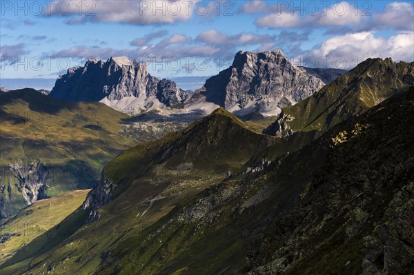 Mountain top with cloudy sky